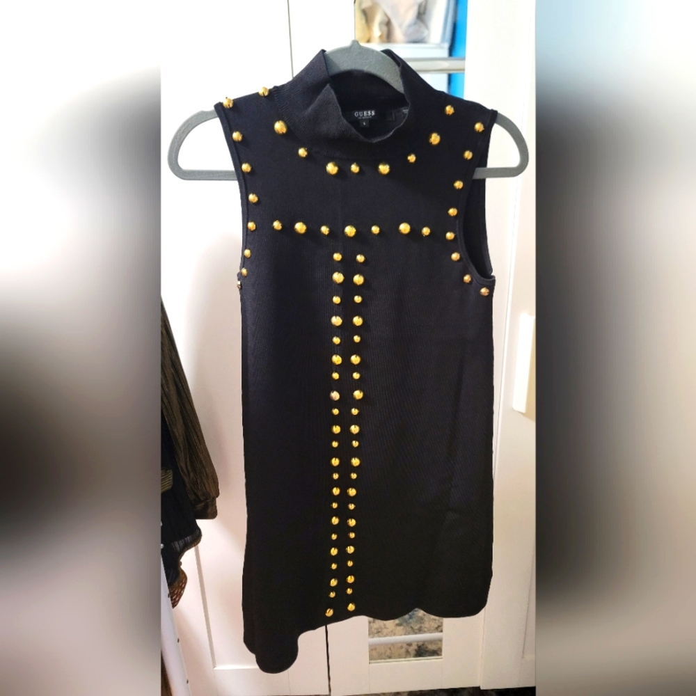 Stylish sleeveless top,dress with gold studding. Size L, color black